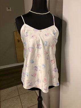 White Cami Top with pastel floral designs & a rosette